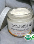 Made Simple Skin Care certified organic raw vegan nonGMO sea buckthorn juniper moisturizer open jar