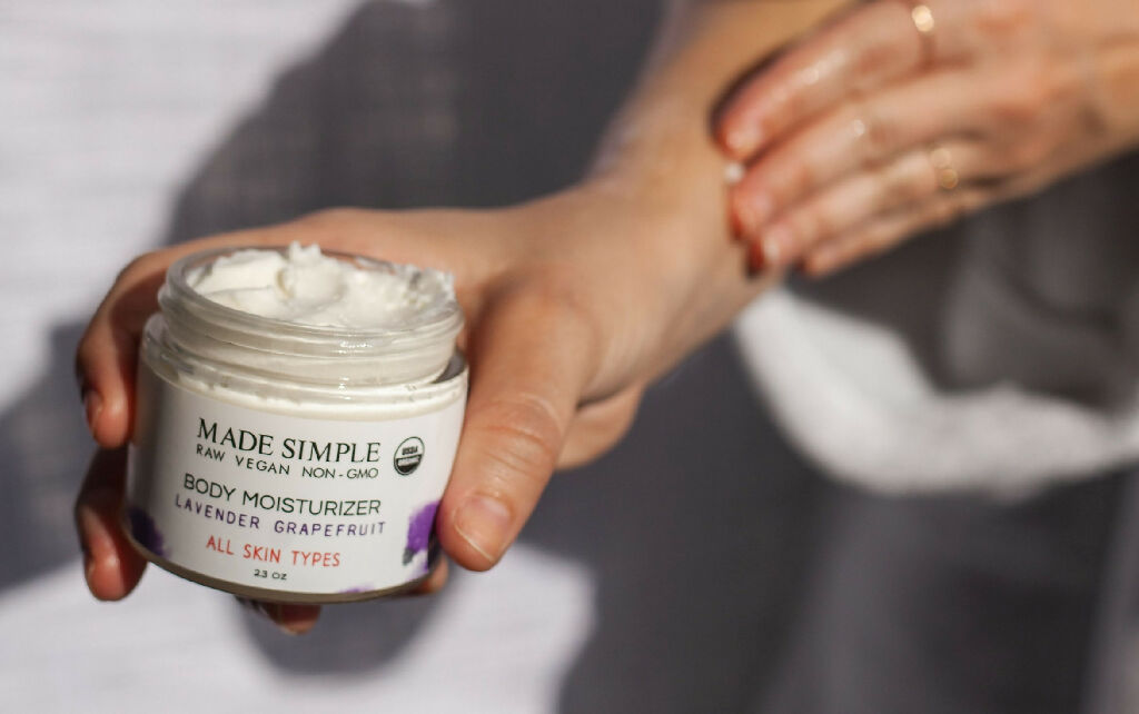 Made Simple Skin Care USDA certified organic raw vegan body moisturizer fingers
